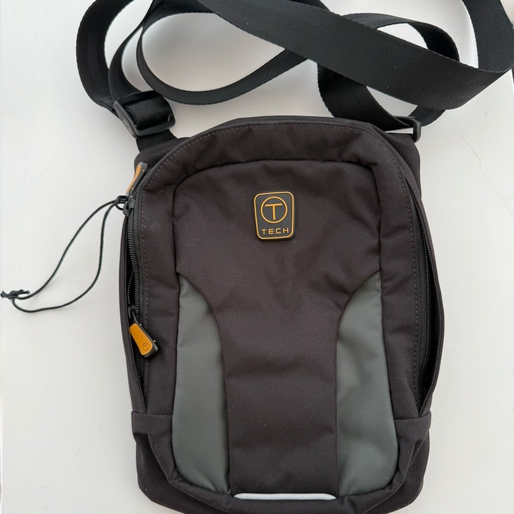 Tumi Tech sleek gray and black crossbody travel bag NWOT